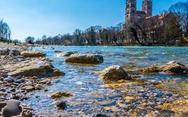 View of the waters of the Isar near the Reichenbach Bridge in Munich.